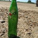 A 7up bottle on the road