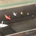 Progressively smaller origami cranes at the Narita airport, Japan